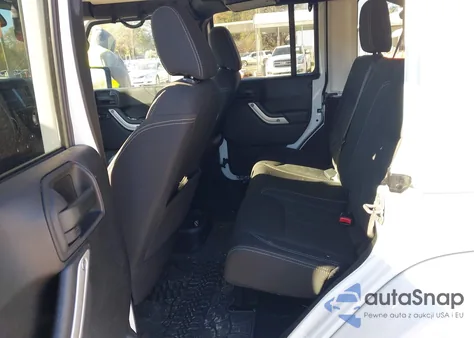 2016 Jeep Wrangler Unlimited Sahara z USA, uszkodzony, nr VIN 1C4BJWEGXGL202643